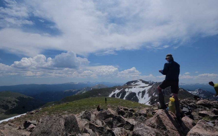 young adult backpacking trip in colorado rockies